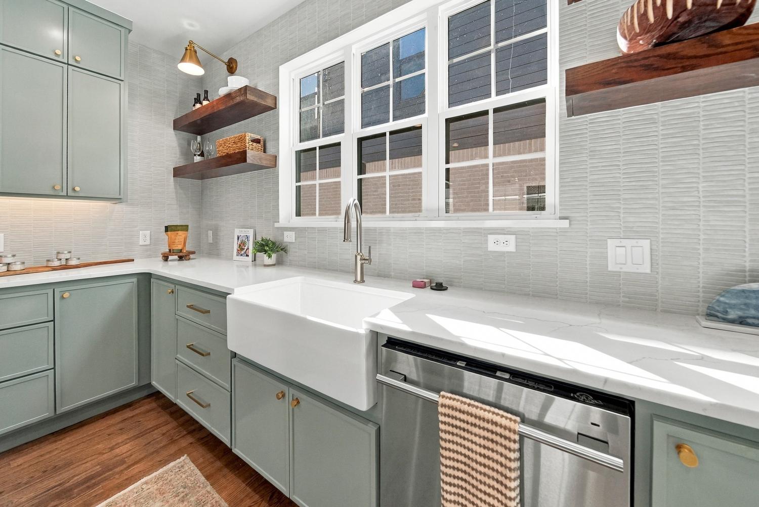 Farmhouse sink under a wide window